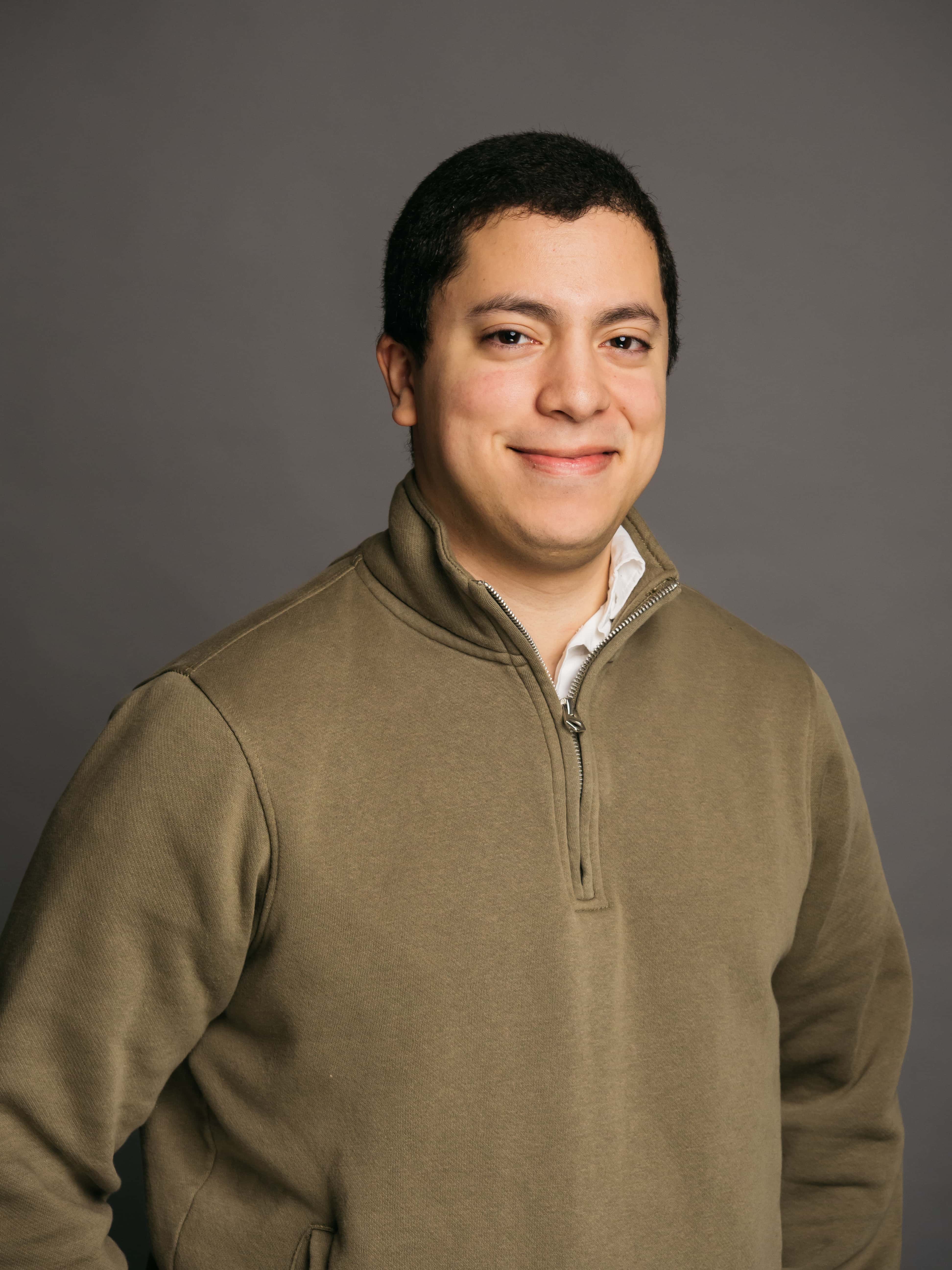 Professional headshot of Carlos Rodriguez